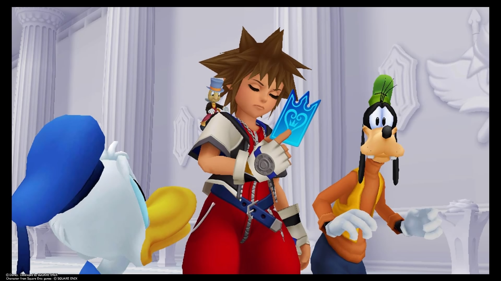 Our protagonist, Sora, looking at a card within the pristine halls of Castle Oblivion. Credit: Disney Interactive and Square Enix