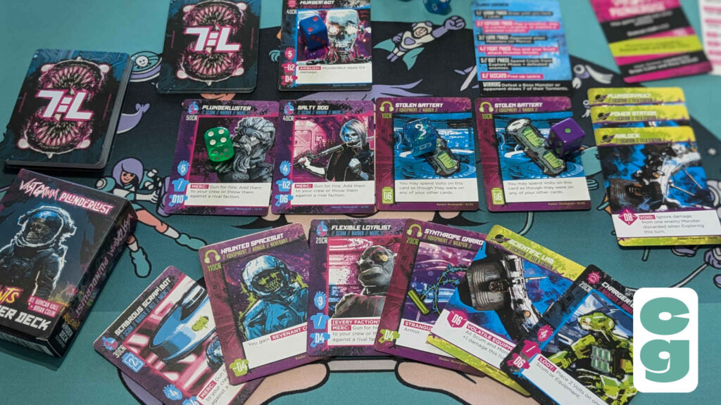 Plunderlust Cards arranged on a playmat during play, and the box also shown to the left.