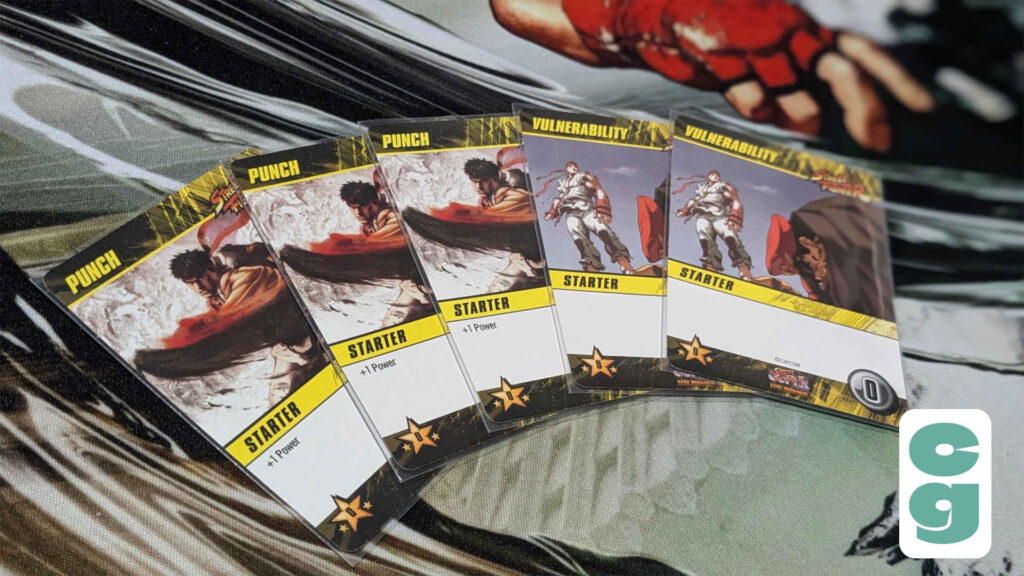 A starting hand of cards in the Street Fighter Deck Building Game