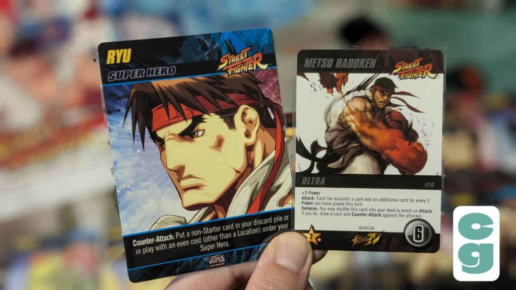 The Ryu Super Hero and his Ultra card from Street Fighter The Deck Building Game