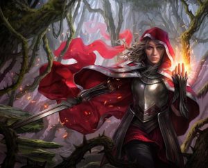 Rowan, a planeswalker, is standing in a forest wearing a red cloak and silver armour. She is casting fire in one hand and holds a sword in the other.