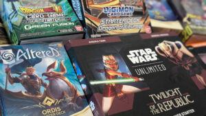 A selection of Starter decks for Digimon, Dragon Ball, Star Wars and Altered