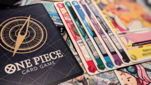 One Piece Card Game cards, with one showing its back and one in each of the game's colors