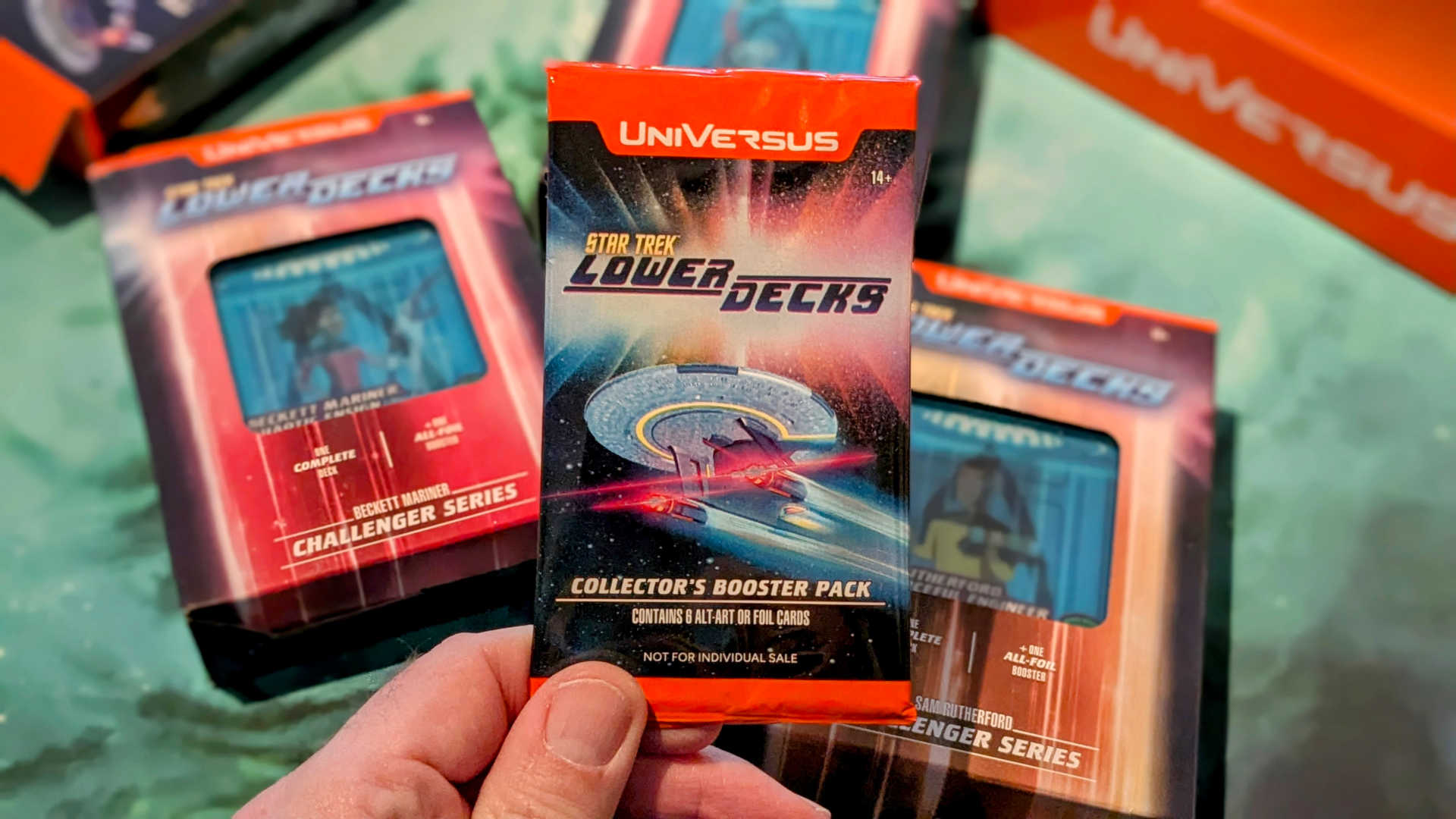 The collector's booster for UniVersus Star Trek Lower Decks