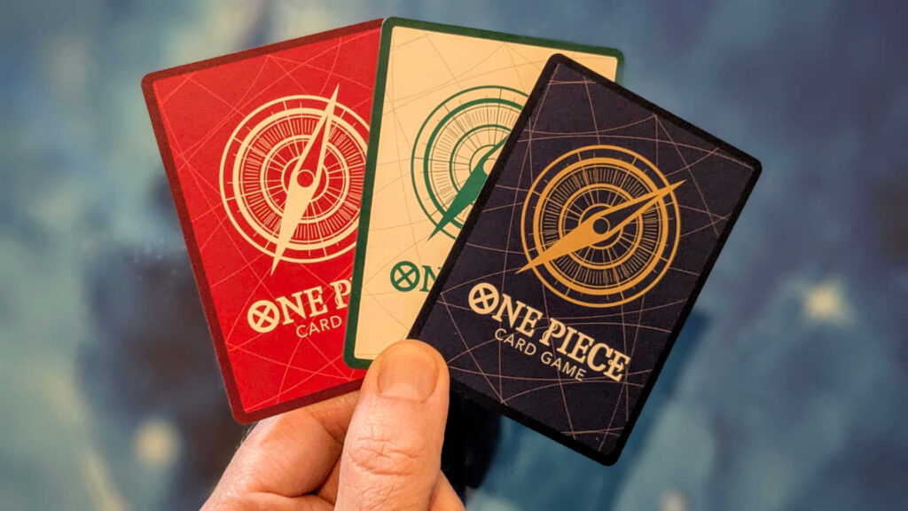 One Piece Card Game backs, showing each of the colors: red, white and blue