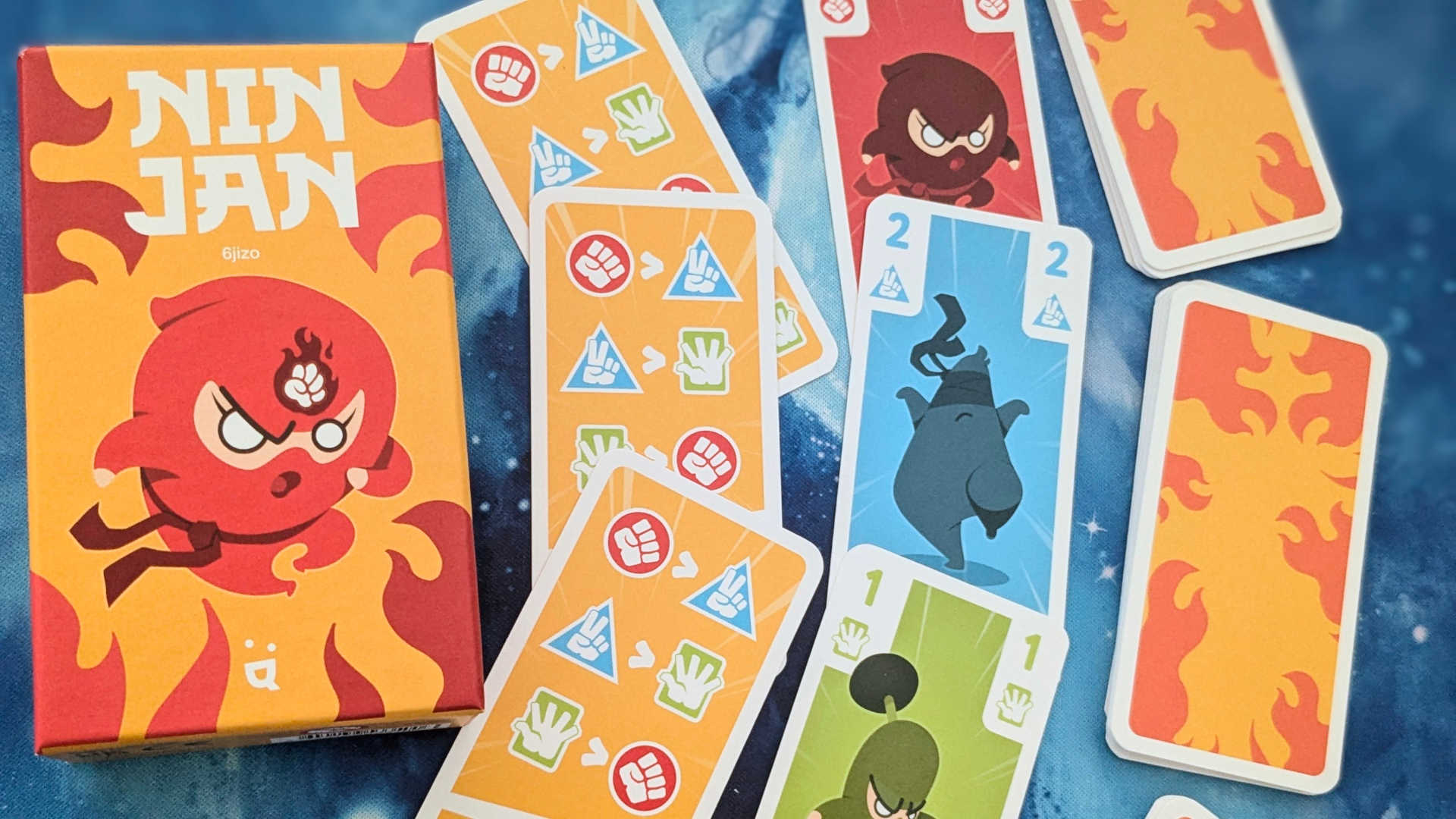 The Ninjan box and cards, including player aids
