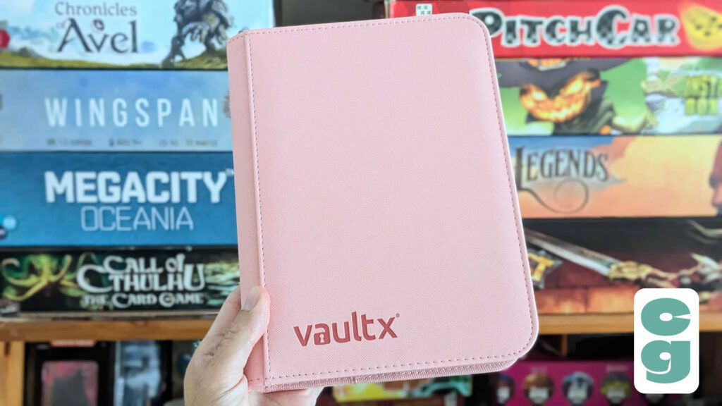 Vault X Exo-Tec Zip Binder 4 Pocket Pink - exterior, held in hand