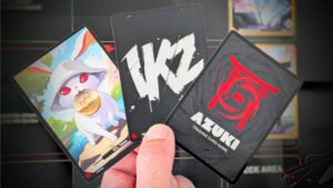 Azuki IKZ and IKZ Token cards in hand